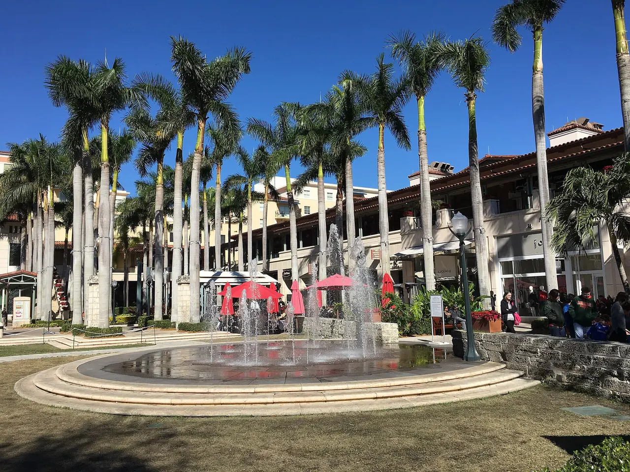 A fountain and palms at Shops at Merrick Park, the open-air shopping center on San Lorenzo Avenue in Coral Gables.