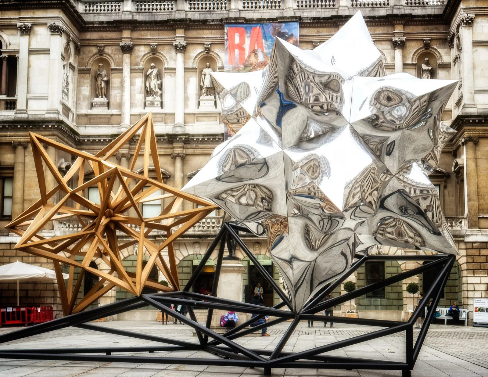 Frank Stella's Inflated Star and Wooden Star at the Royal Academy of Arts in London. The Stella work planned for Ponce Circle Park, Puffed and Inverted Star II, is a different piece.