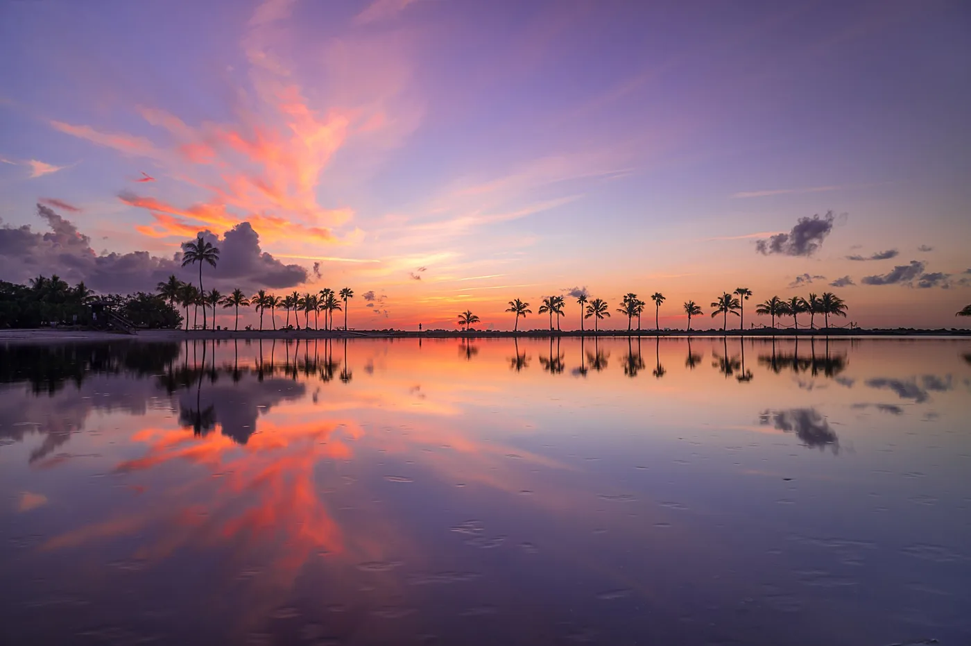Sunrise over Biscayne Bay from the beach at Matheson Hammock Park in Coral Gables.