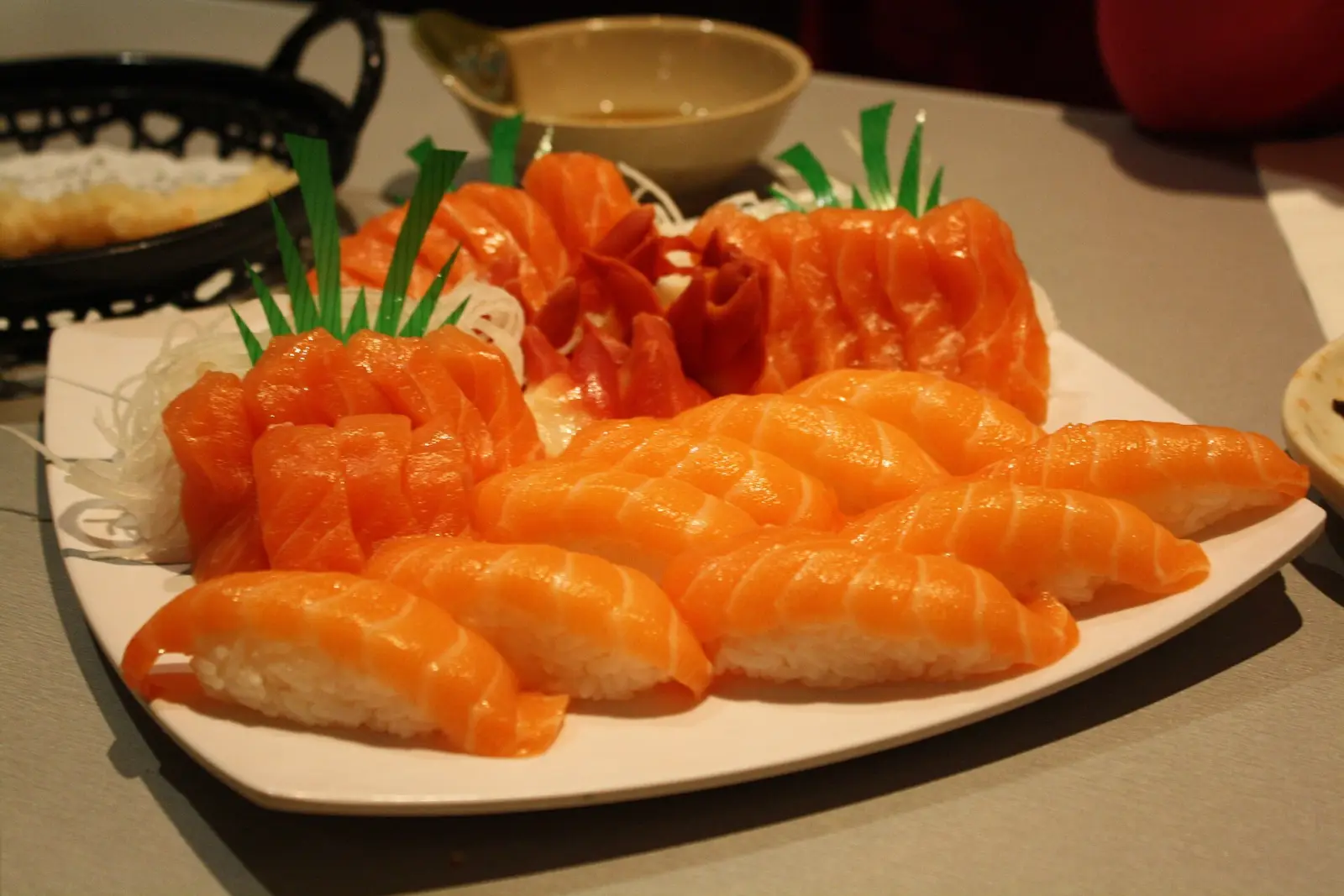 A platter of salmon sushi and sashimi. The photo was not taken at a Coral Gables restaurant.