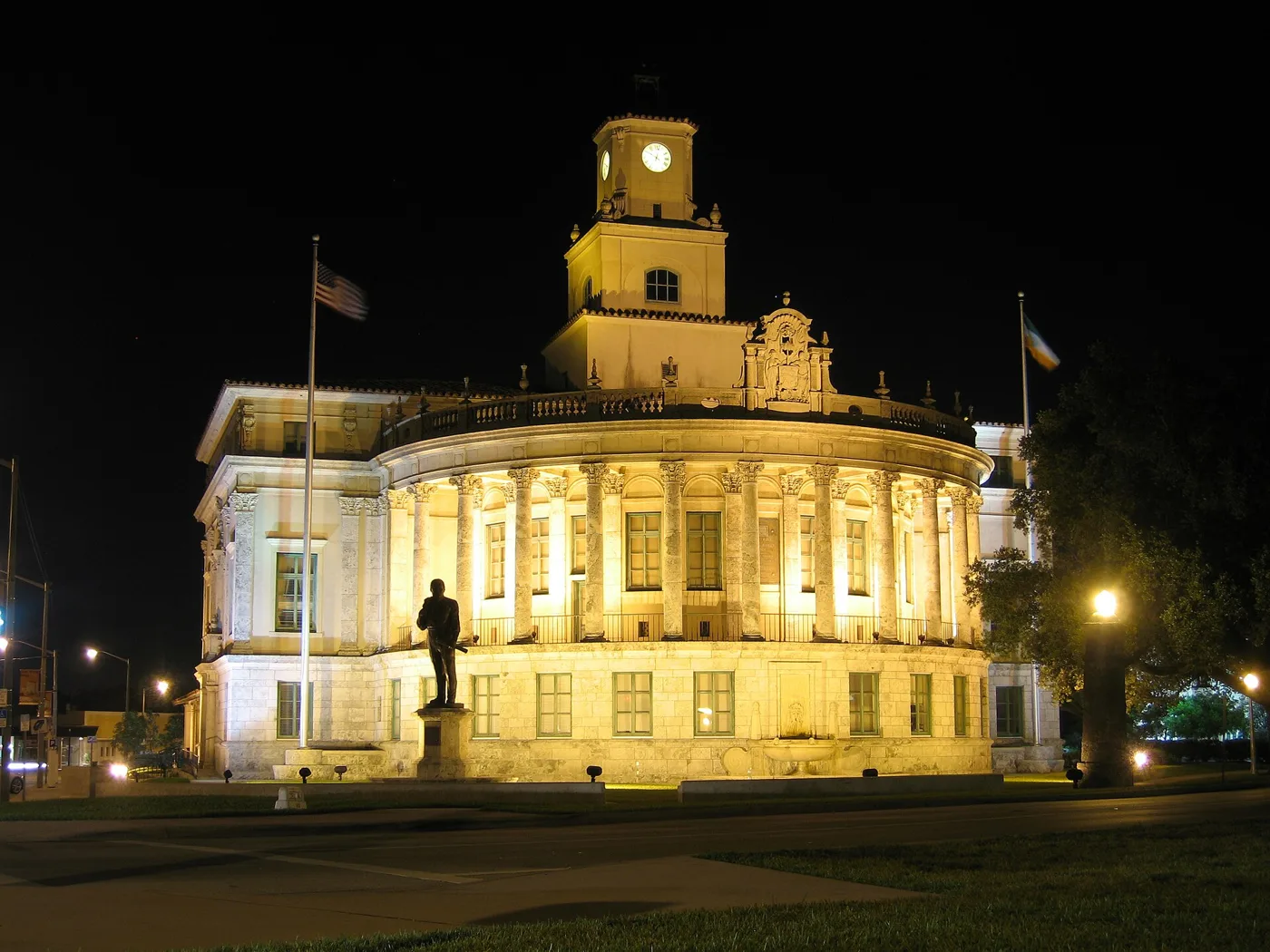 Coral Gables City Hall lit up at night on Biltmore Way.